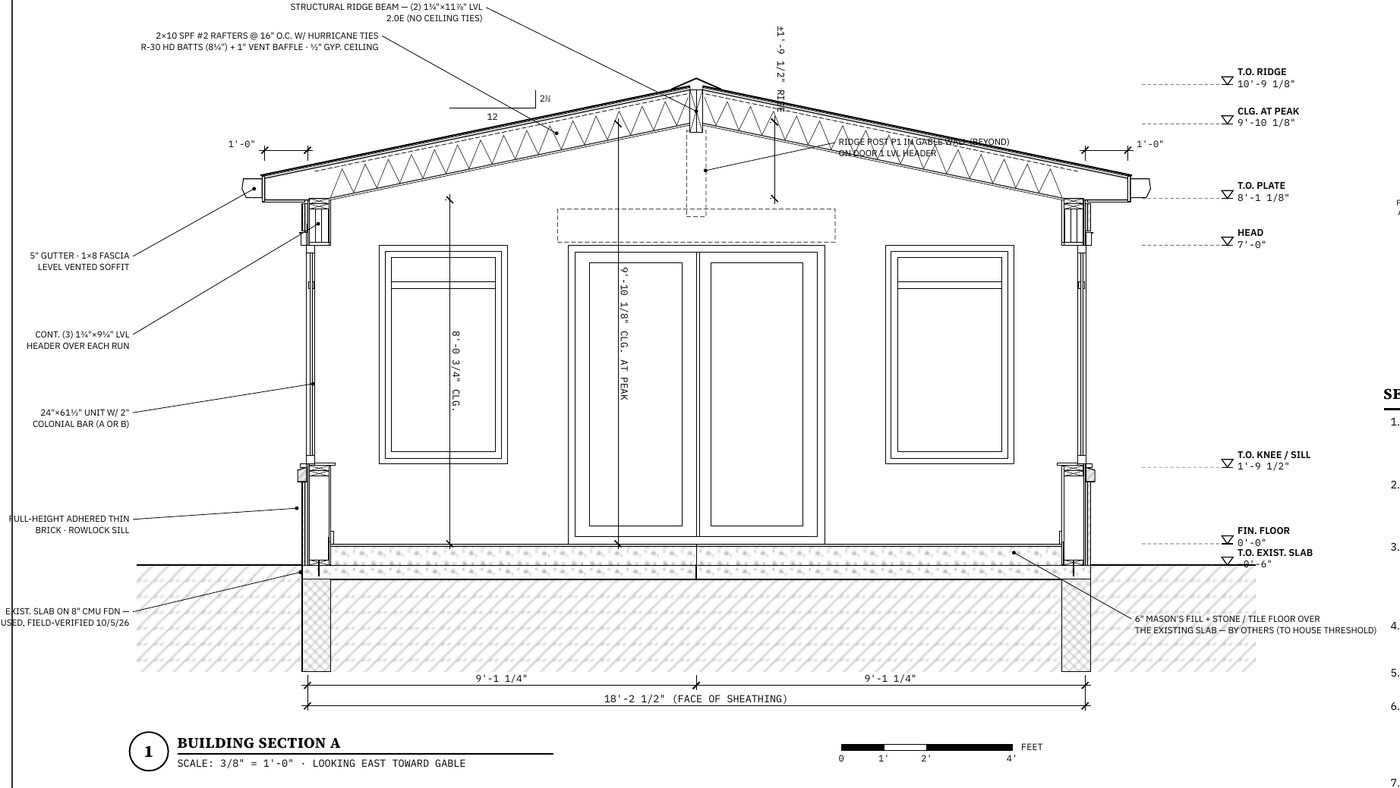 Building section through a sunroom showing rafters, ridge beam, headers, foundation and ceiling heights